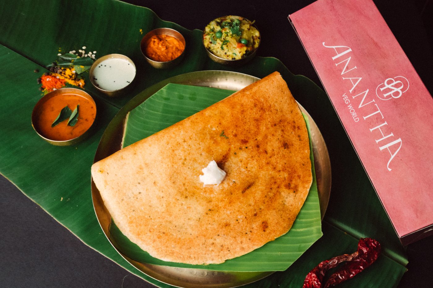 Benne masala dosa served on banana leaf with chutney and sambhar at Anantha, Mira Road